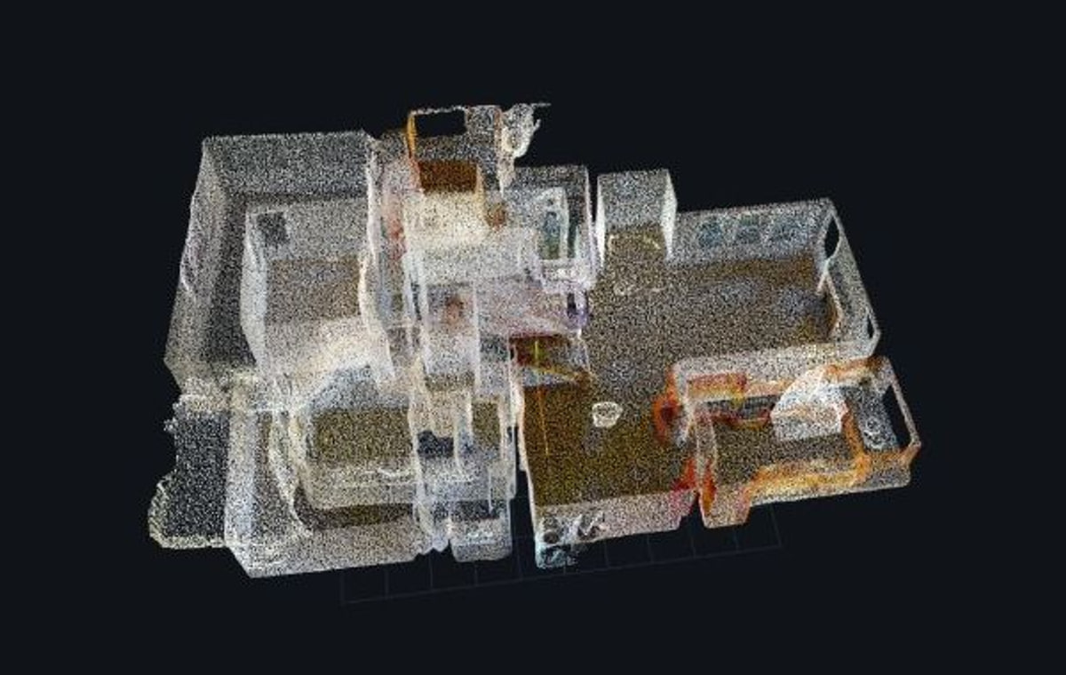 Raw point-cloud capture of the same building interior